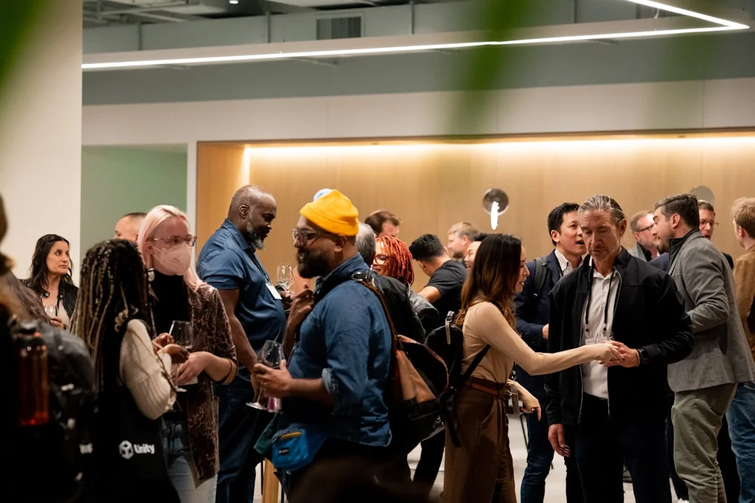 Developers networking at a tech conference